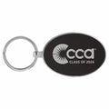 Black oval keychain with 'CCA Class of 2026' engraved text on a white background